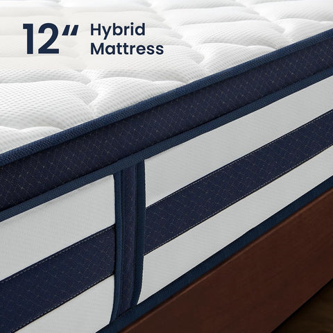 Close-up of a 12-inch hybrid mattress with a white quilted top, navy blue side trim, and a brown base, shown with the text '12" Hybrid Mattress' in the upper left corner.